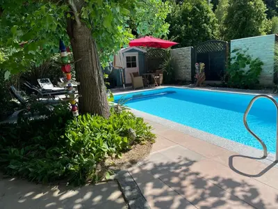 Der Swimmingpool an oder in der Nähe von Schöne Wohnung mit Pool und Sauna zum Wohlfühlen