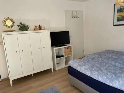 Ein Bett oder Betten in einem Zimmer der Unterkunft Schöne Wohnung mit Pool und Sauna zum Wohlfühlen