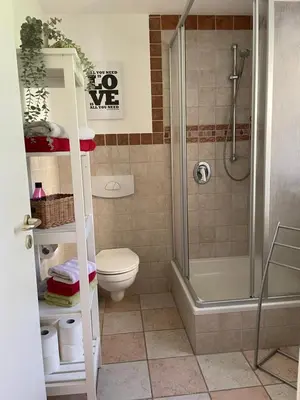 Ein Badezimmer in der Unterkunft Schöne Wohnung mit Pool und Sauna zum Wohlfühlen