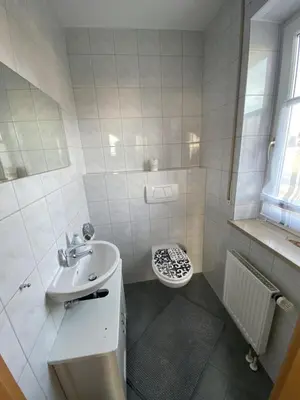 Ein Badezimmer in der Unterkunft Ferienhaus Kutzenhausen