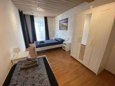 Ein Bett oder Betten in einem Zimmer der Unterkunft Ferienhaus Kutzenhausen