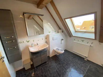 Ein Badezimmer in der Unterkunft Ferienhaus Kutzenhausen