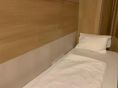 Ein Bett oder Betten in einem Zimmer der Unterkunft Hotel New Fair Munich Messe