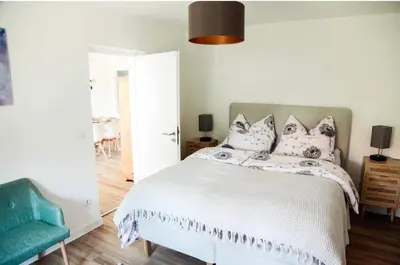 Ein Bett oder Betten in einem Zimmer der Unterkunft Ferienwohnung Familienglück