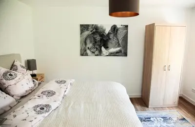 Ein Bett oder Betten in einem Zimmer der Unterkunft Ferienwohnung Familienglück