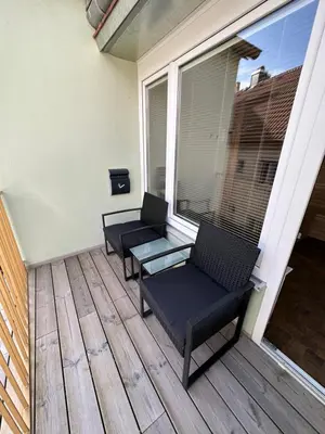 Ein Sitzbereich in der Unterkunft Das Fischer Boardinghouse KF