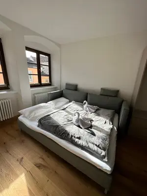 Ein Bett oder Betten in einem Zimmer der Unterkunft Das Fischer Boardinghouse KF
