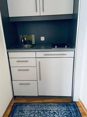 Küche/Küchenzeile in der Unterkunft Hotelturm Augsburg Appartment 29 Stock