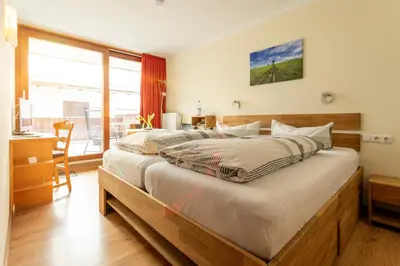 Ein Bett oder Betten in einem Zimmer der Unterkunft Kurbad und Landhaus Siass