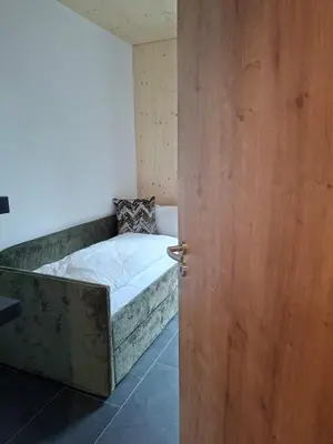 Ein Bett oder Betten in einem Zimmer der Unterkunft Kurbad und Landhaus Siass