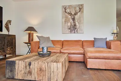 Ein Sitzbereich in der Unterkunft Sunshine Apartment Spirit of Deer