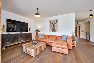 Ein Sitzbereich in der Unterkunft Sunshine Apartment Spirit of Deer