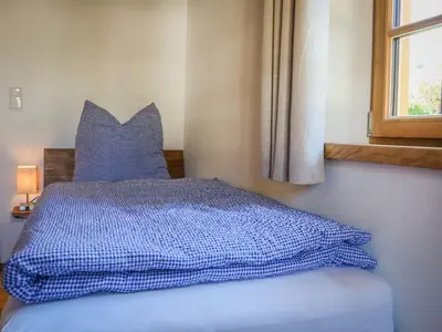 Ein Bett oder Betten in einem Zimmer der Unterkunft Ferienwohnungen Koller