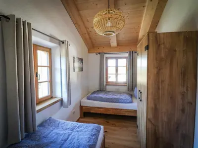 Ein Bett oder Betten in einem Zimmer der Unterkunft Ferienwohnungen Koller