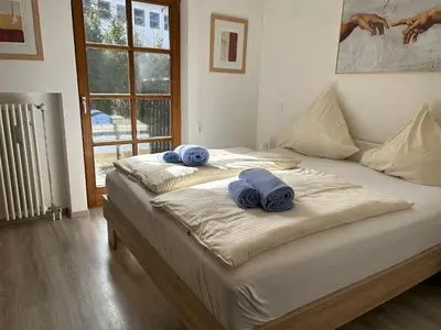 Ein Bett oder Betten in einem Zimmer der Unterkunft Queen de Luxe
