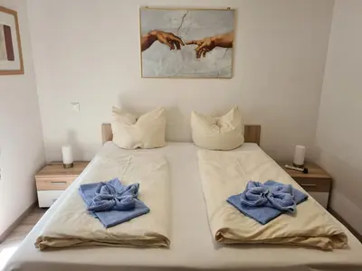 Ein Bett oder Betten in einem Zimmer der Unterkunft Queen de Luxe