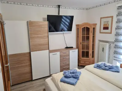 Ein Bett oder Betten in einem Zimmer der Unterkunft Queen de Luxe