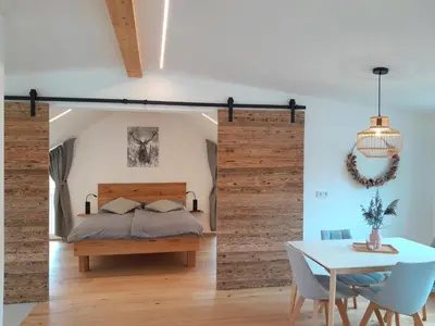 Ein Bett oder Betten in einem Zimmer der Unterkunft Ferienwohnung Bergblick Loft