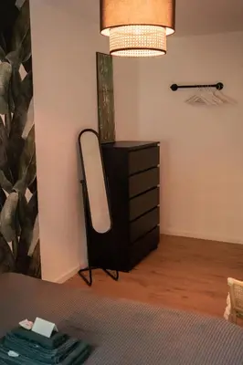 Ein Bett oder Betten in einem Zimmer der Unterkunft MOREHOME Sonnenterrasse & Heimkino Switch 2