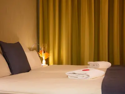 Ein Bett oder Betten in einem Zimmer der Unterkunft Hotel Bildungsblick