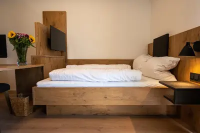 Ein Bett oder Betten in einem Zimmer der Unterkunft HeindlHof