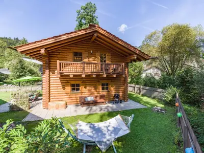 Ein Garten an der Unterkunft Audorfer Blockhaus