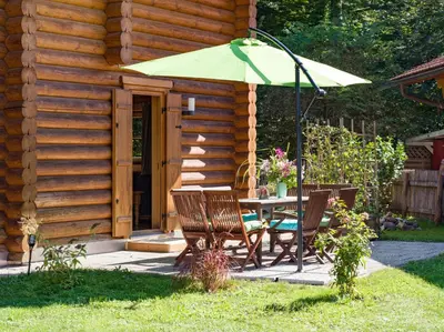 Ein Garten an der Unterkunft Audorfer Blockhaus