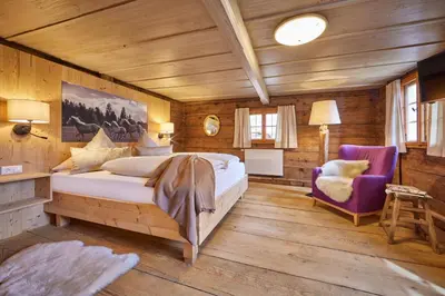 Ein Bett oder Betten in einem Zimmer der Unterkunft Haus Hoamat - Almrausch