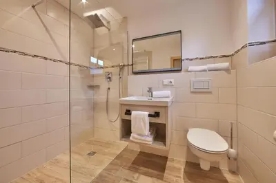 Ein Badezimmer in der Unterkunft Haus Hoamat - Bergfeuer