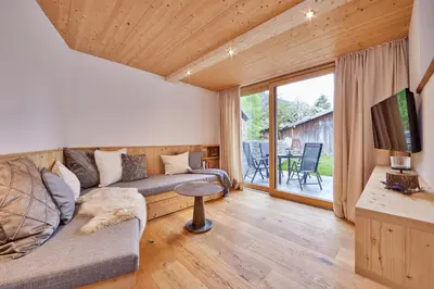 Ein Sitzbereich in der Unterkunft Haus Hoamat - Bergfeuer