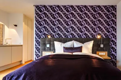 Ein Bett oder Betten in einem Zimmer der Unterkunft Hotel im Bunker