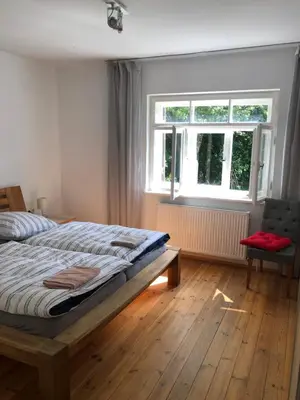 Ein Bett oder Betten in einem Zimmer der Unterkunft Wohnung mit Charme