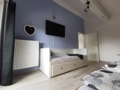 Ein Bett oder Betten in einem Zimmer der Unterkunft Ferienwohnung Chiemseeliebe