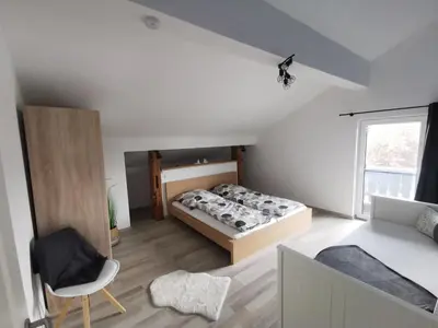 Ein Bett oder Betten in einem Zimmer der Unterkunft Ferienwohnung Chiemseeliebe
