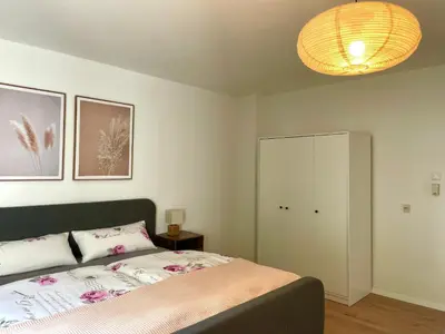 Ein Bett oder Betten in einem Zimmer der Unterkunft Kelsbachhaus EG