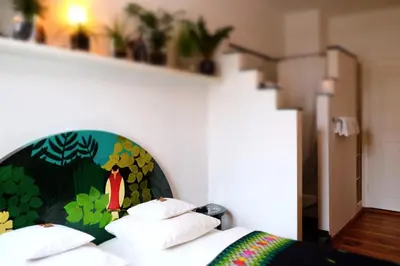 Ein Bett oder Betten in einem Zimmer der Unterkunft Hotel Maurerhansl