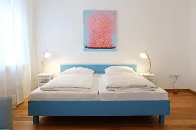 Ein Bett oder Betten in einem Zimmer der Unterkunft Hotel Maurerhansl