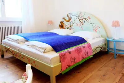 Ein Bett oder Betten in einem Zimmer der Unterkunft Hotel Maurerhansl