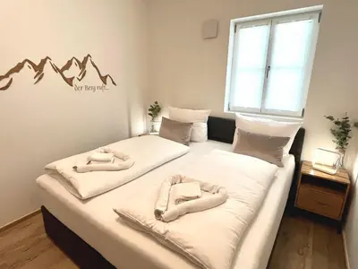 Ein Bett oder Betten in einem Zimmer der Unterkunft Palais Karl-Theodor