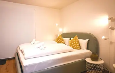 Ein Bett oder Betten in einem Zimmer der Unterkunft GM-Stays - Studio am Dürnbach - Modern, ruhig & zentral am Schliersee mit Parkplatz - BRIGHT Collection