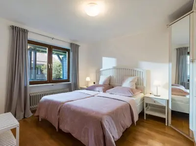 Ein Bett oder Betten in einem Zimmer der Unterkunft Ferienwohnung Panoramablick