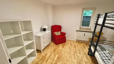 Ein Bett oder Betten in einem Zimmer der Unterkunft Large holiday apartment with sauna, terrace, garden and open fireplace