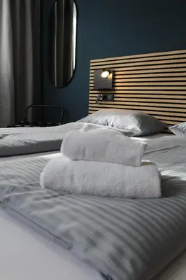 Ein Bett oder Betten in einem Zimmer der Unterkunft ARRIVEL Apartements Heimstetten - bisher Novitel