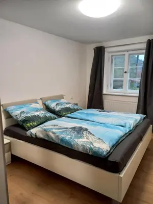 Ein Bett oder Betten in einem Zimmer der Unterkunft Zur alten Schmiede
