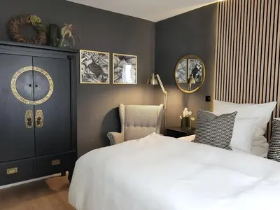 Ein Bett oder Betten in einem Zimmer der Unterkunft Ferienwohnung Anna Maria Erding