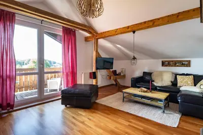 Ein Sitzbereich in der Unterkunft Ferienwohnung Zur Wache