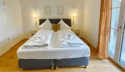 Ein Bett oder Betten in einem Zimmer der Unterkunft Ferienwohnung 