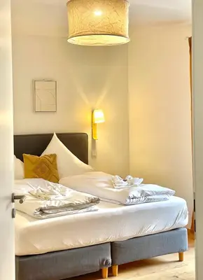 Ein Bett oder Betten in einem Zimmer der Unterkunft Ferienwohnung 