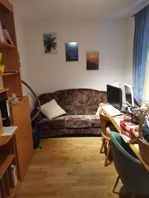 Ein Sitzbereich in der Unterkunft Cosy Room