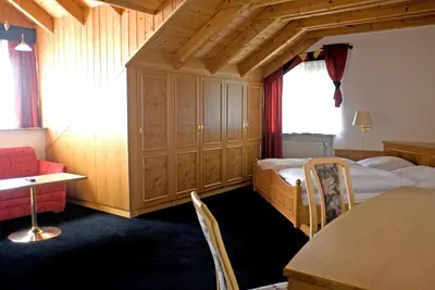 Ein Bett oder Betten in einem Zimmer der Unterkunft Hotel Zum Fischerwirt
